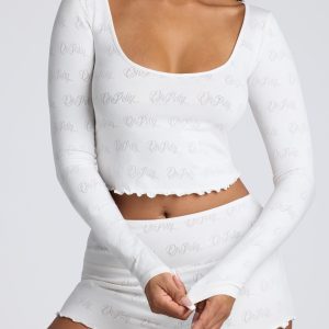 Long Sleeve Scoop Neck Pointelle Crop Top in White