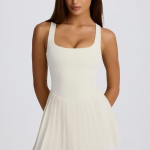 Soft Active Open-Back Pleated Tennis Dress in Ivory