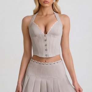 Low-Rise Pleated Mini Skirt in Ecru