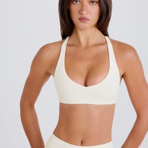 Four-Way Stretch Crossback V-Neck Sports Bra in Cream